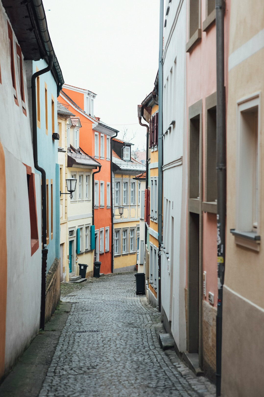 Historic European old town street with colourful tenement houses