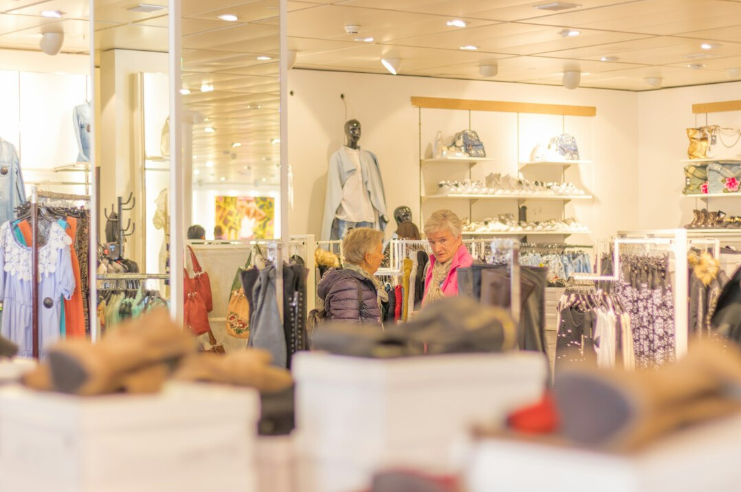 store detective watching shoppers