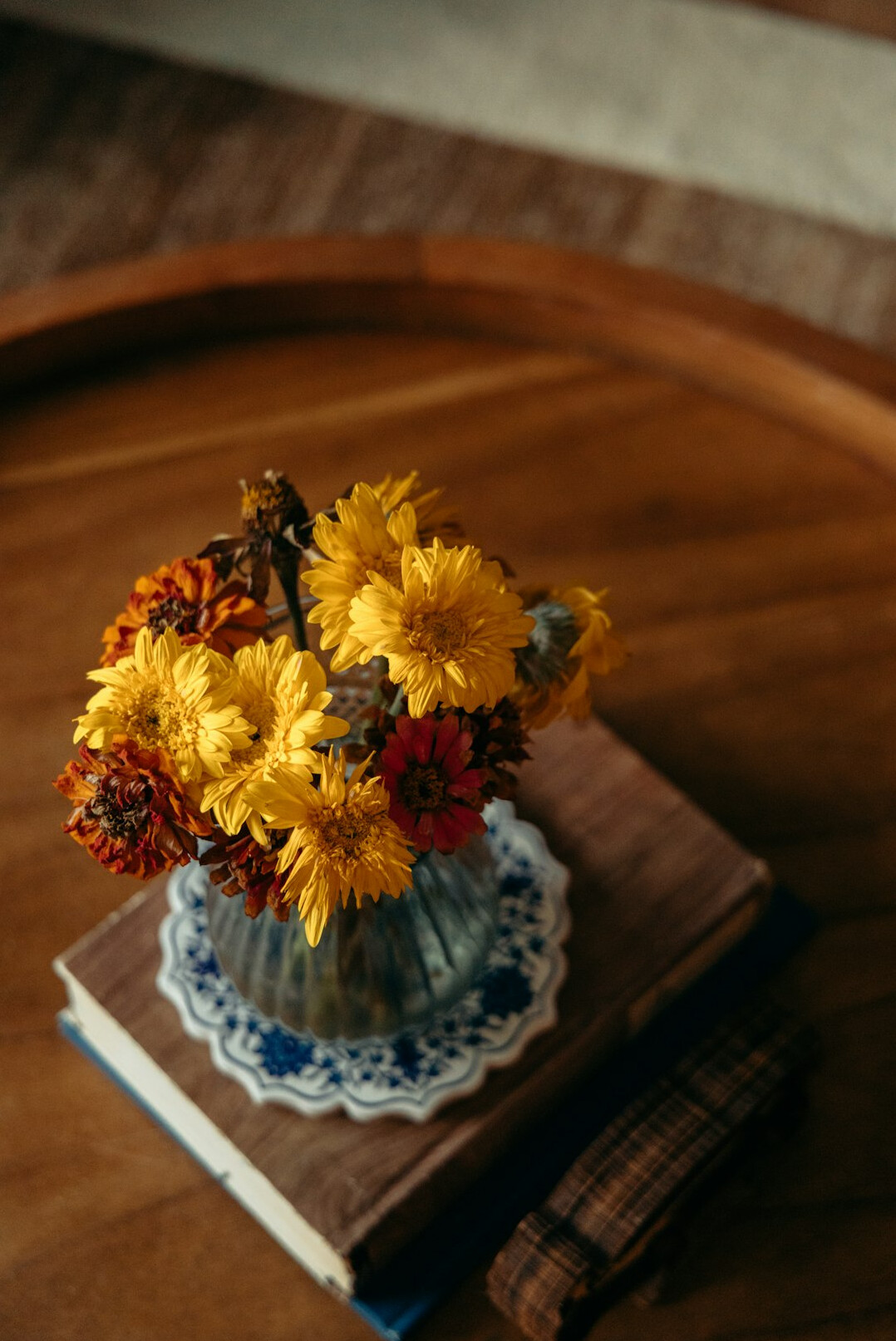 Stack of books on a wooden table